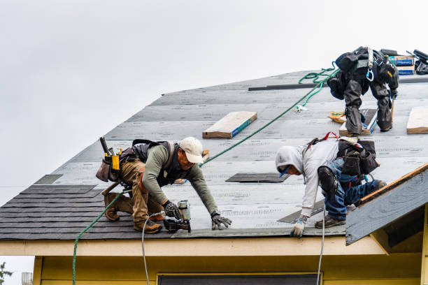 Professional Gutter Installation technician working in Silver Lake, NH